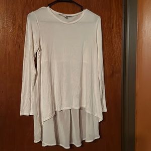 White hi and low shirt back bottom is sheer very cute